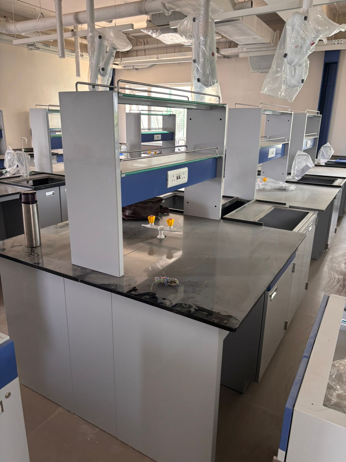 Laboratory furniture and fume hood workstation installed in modern lab